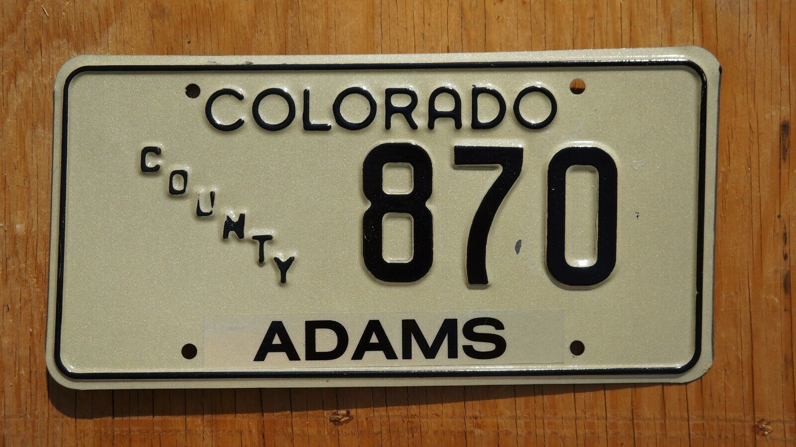1990's  Adams County Colorado License Plate # 870